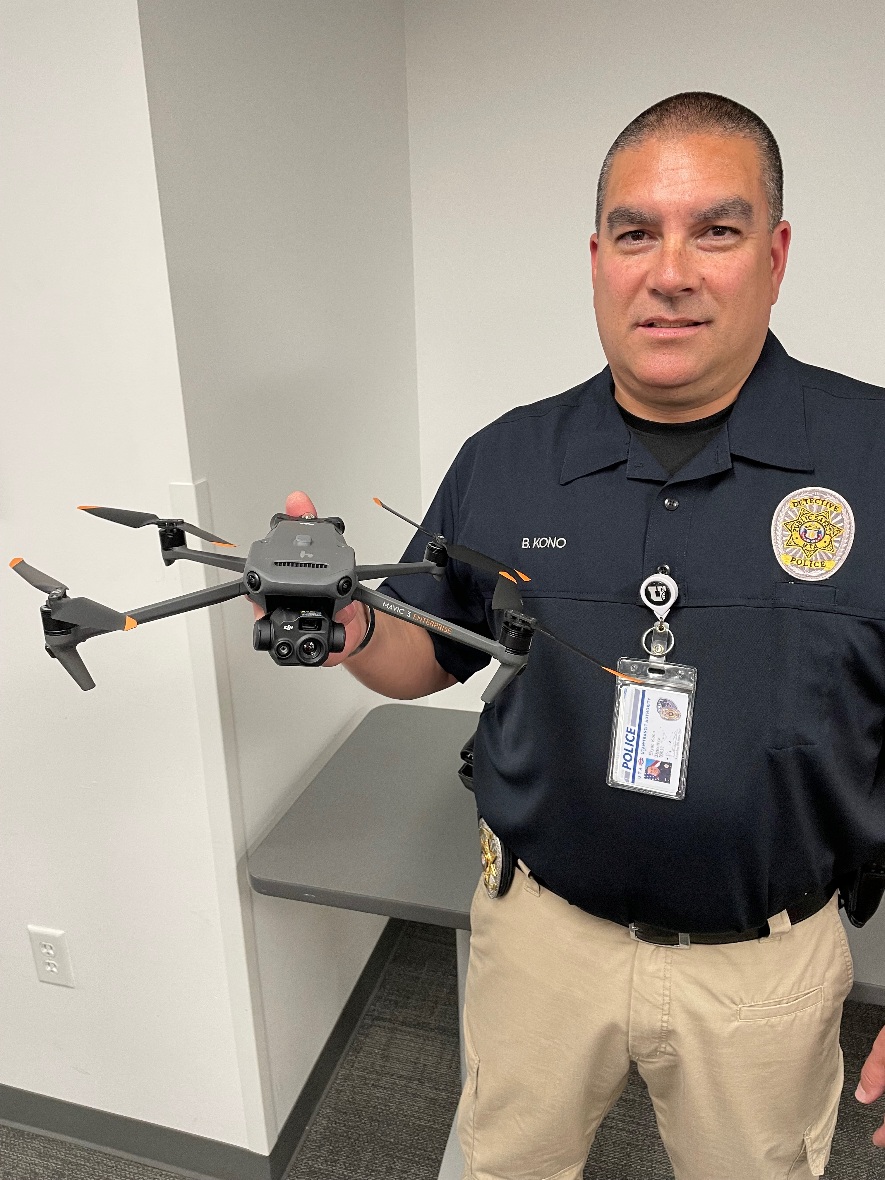 UTA Officer holding drone